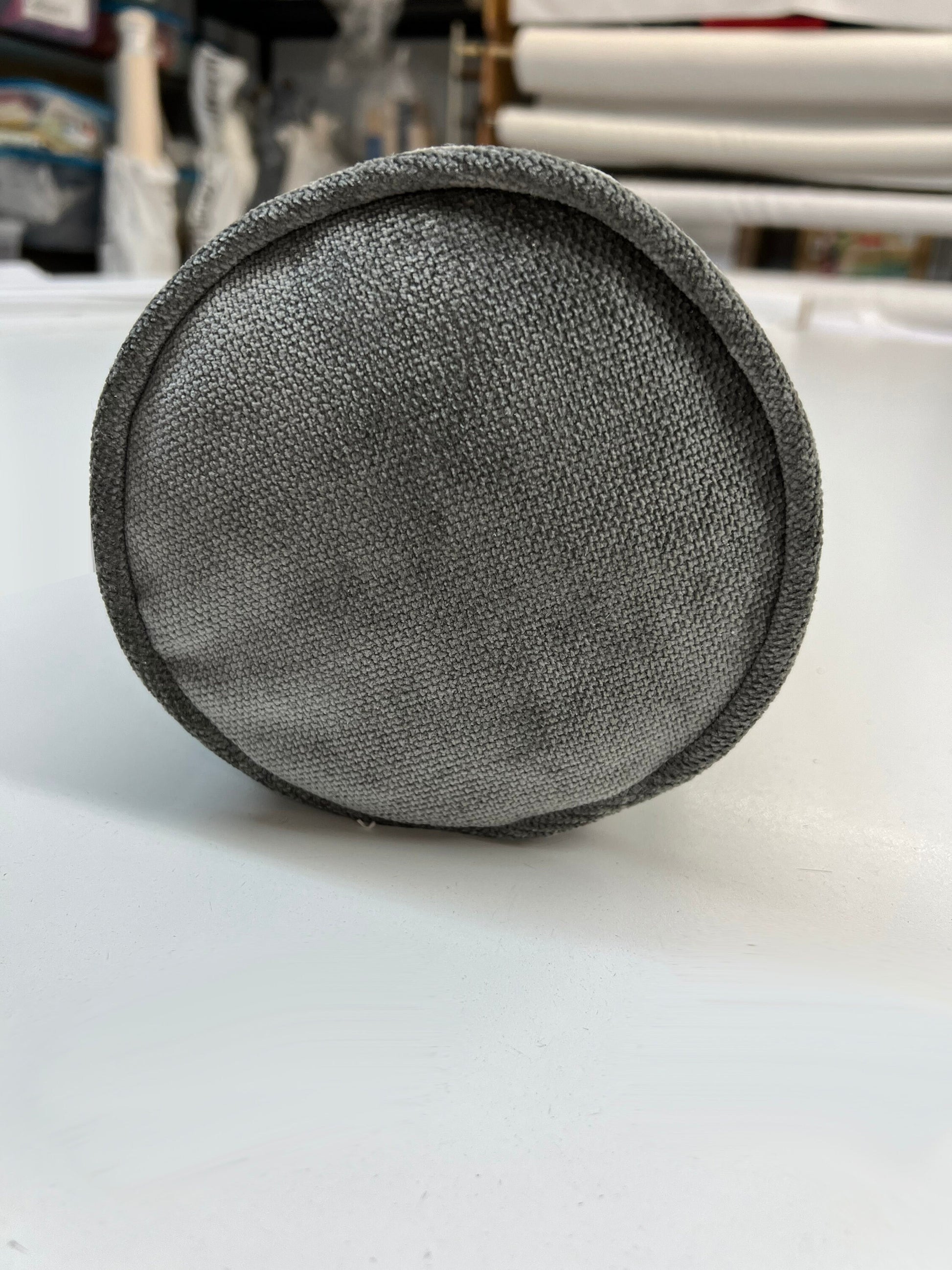 Round piped end of the bolster, sewn in our Toronto workroom — LOGANOVA