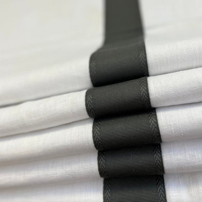 Relaxed Roman shade lowered, showing the smooth face and waterfall hem