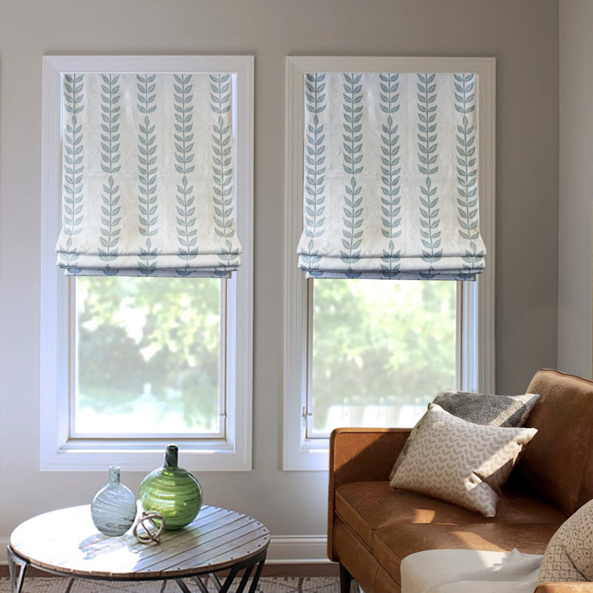 Elton Vine Belgian linen relaxed Roman shade hanging in a window