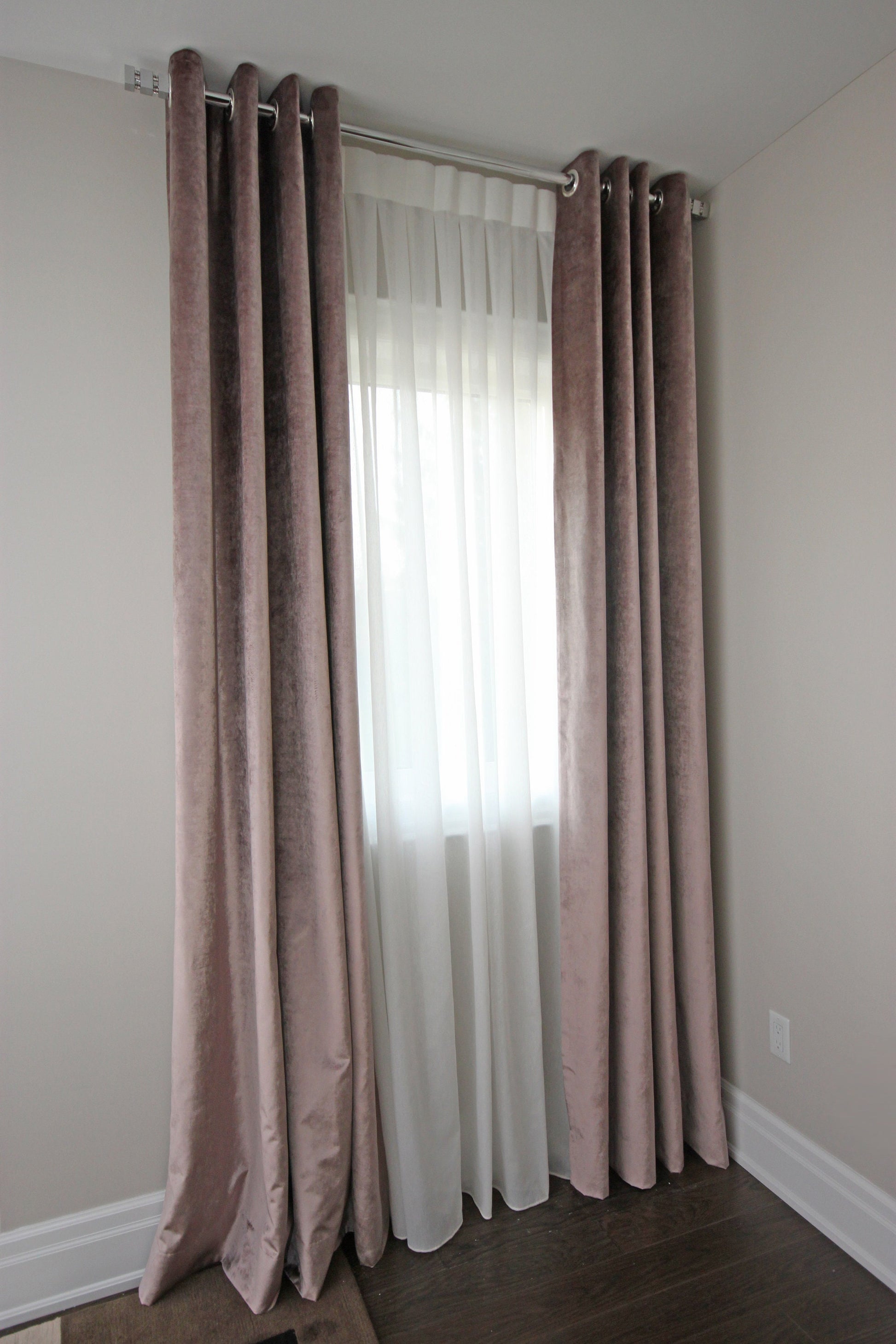 Rowan grommet drapery layered over a white sheer — LOGANOVA