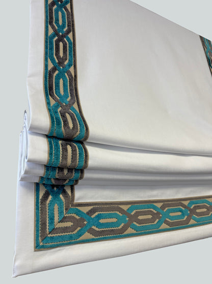 Close view of the teal Trend Envision interlocking tape stitched along the shade edge