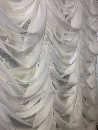 Austrian sheer shade detail, scalloped hem and vertical shirring