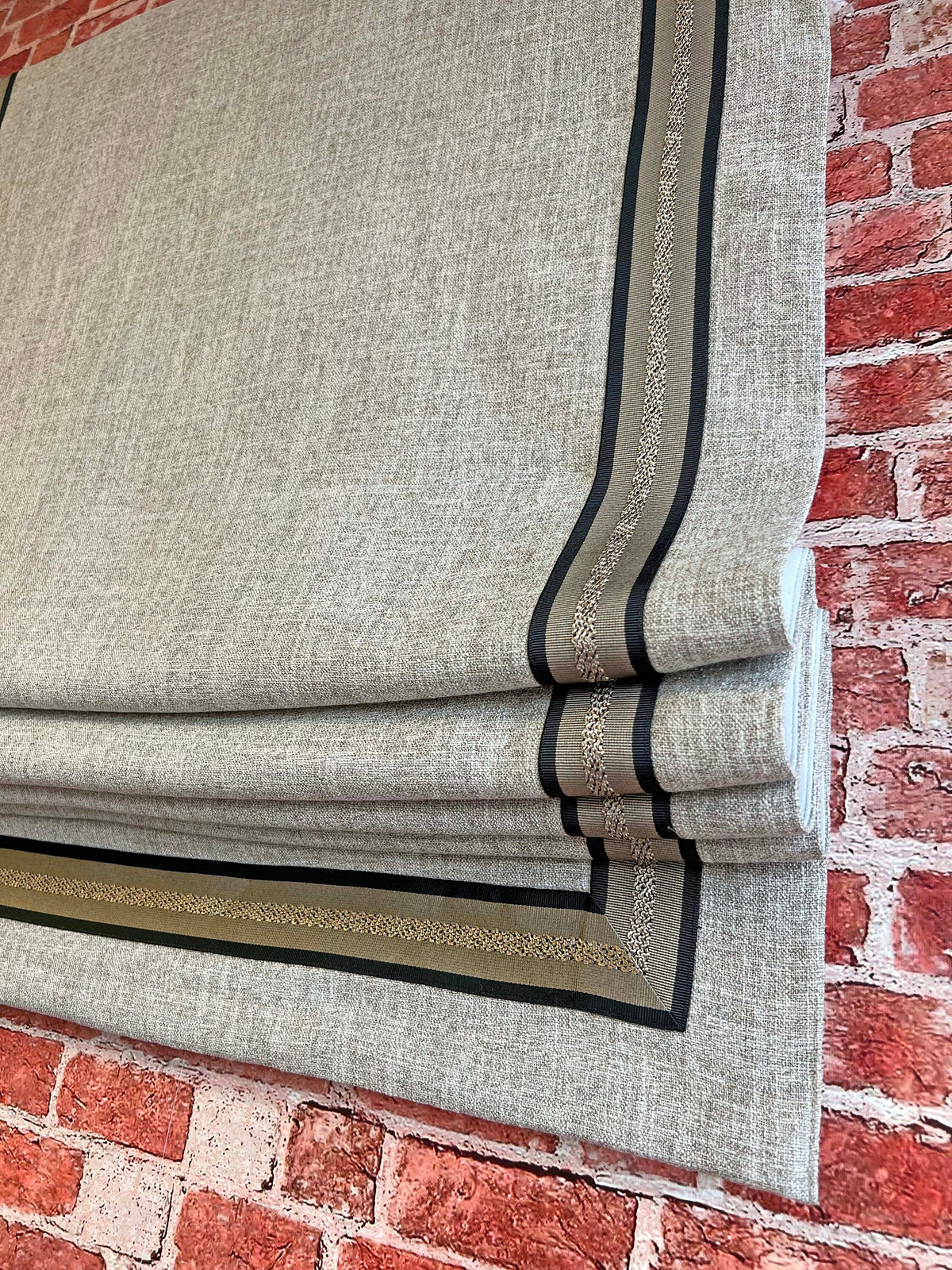 Close-up of the CE58 woven tape trim on a Toronto relaxed Roman shade