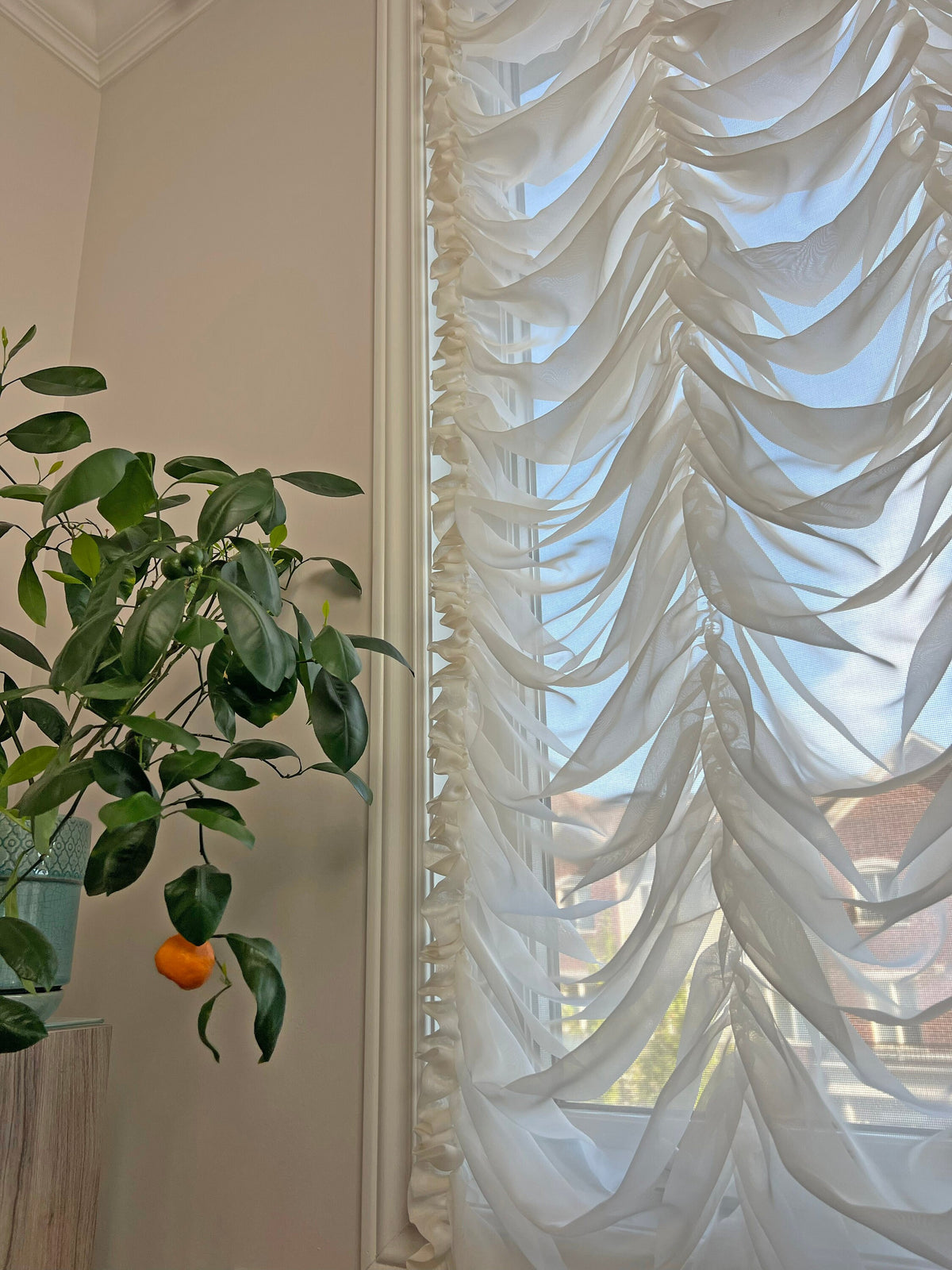 Close-up of the shirred Austrian swags in Empire Voile sheer fabric