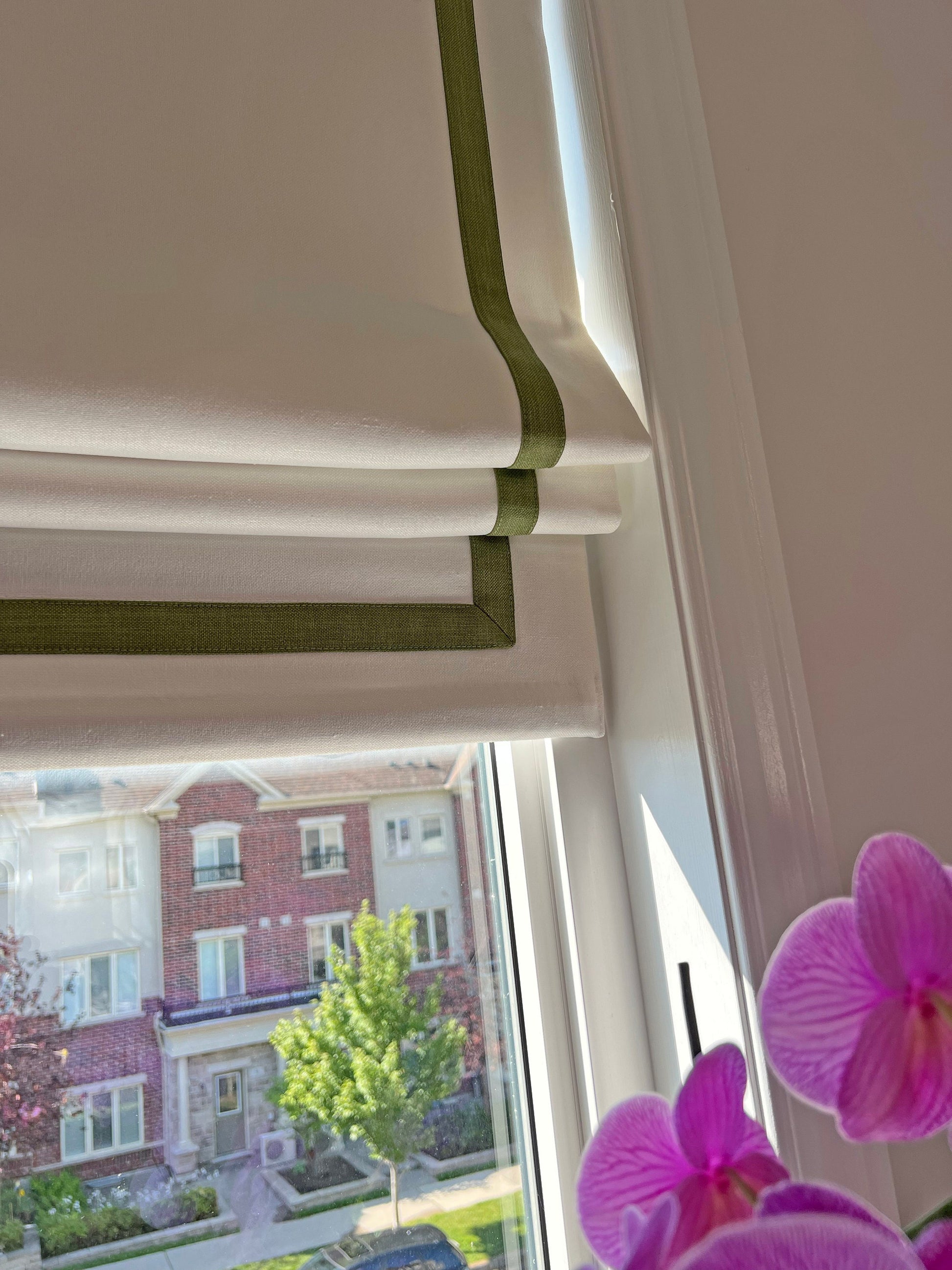 Cream linen roman shade with pine border, handmade in Toronto