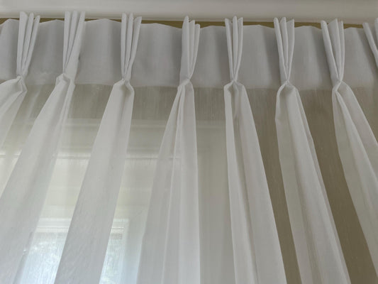 Marbella triple pleat sheer drapery panel at a window