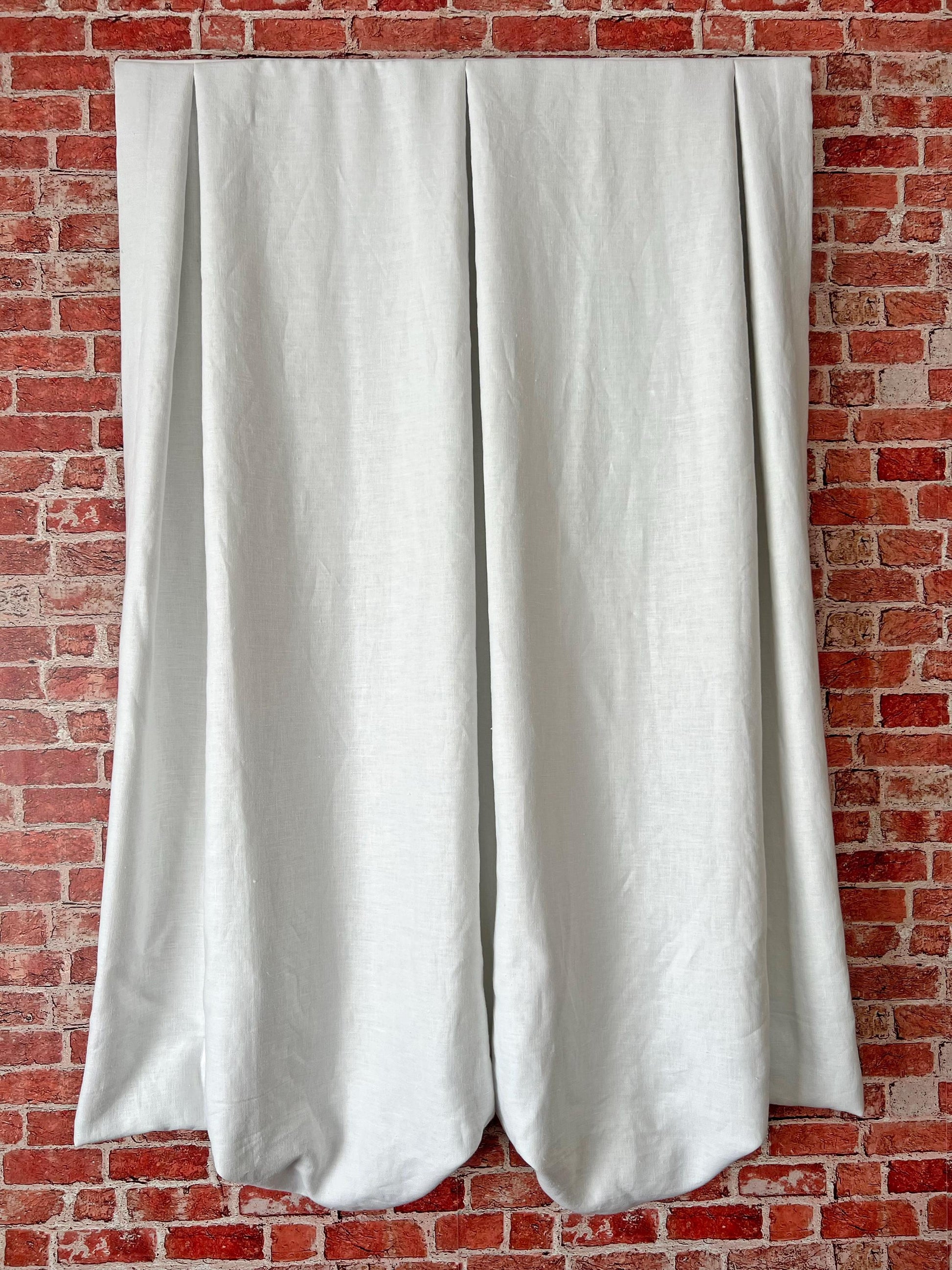 London Roman shade fully lowered, inverted pleats with soft blackout lining — LOGANOVA