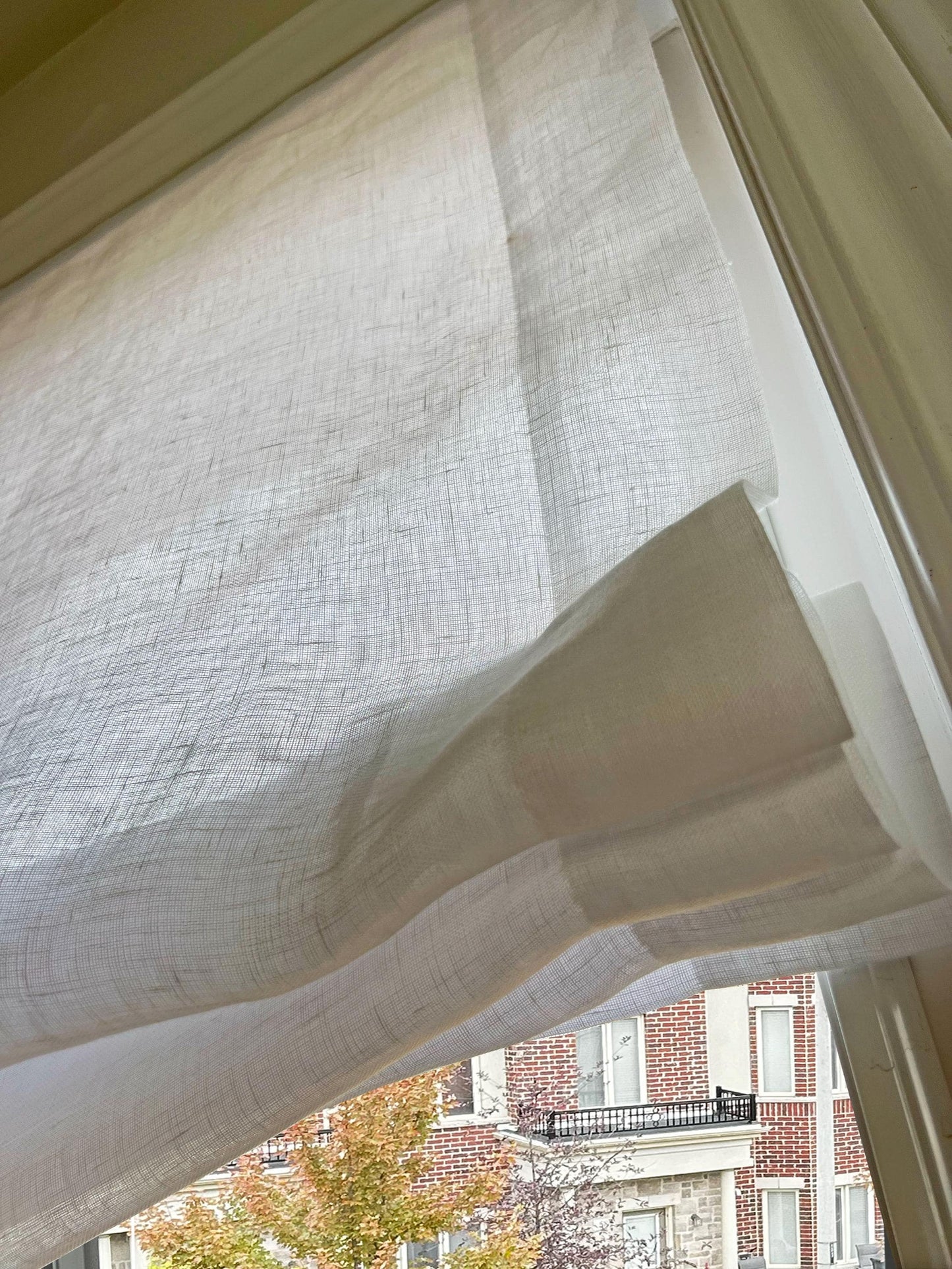 Relaxed fold detail of sheer 100% linen Utopia fabric, open weave up close — LOGANOVA