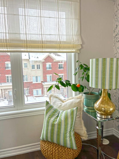 Spinello striped flat Roman shade at a window — soft daylight