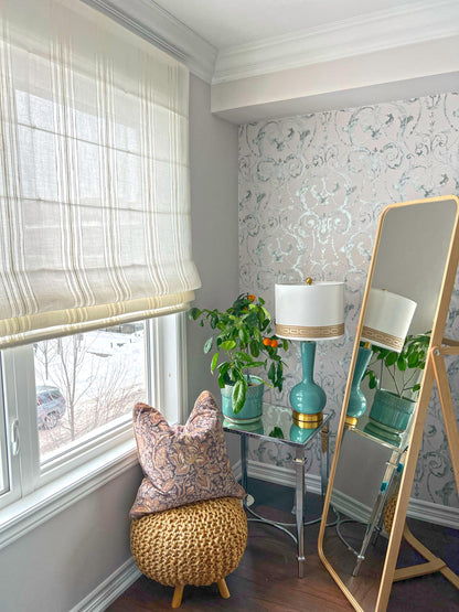 Spinello flat Roman shade in a styled corner — striped, light-filtering