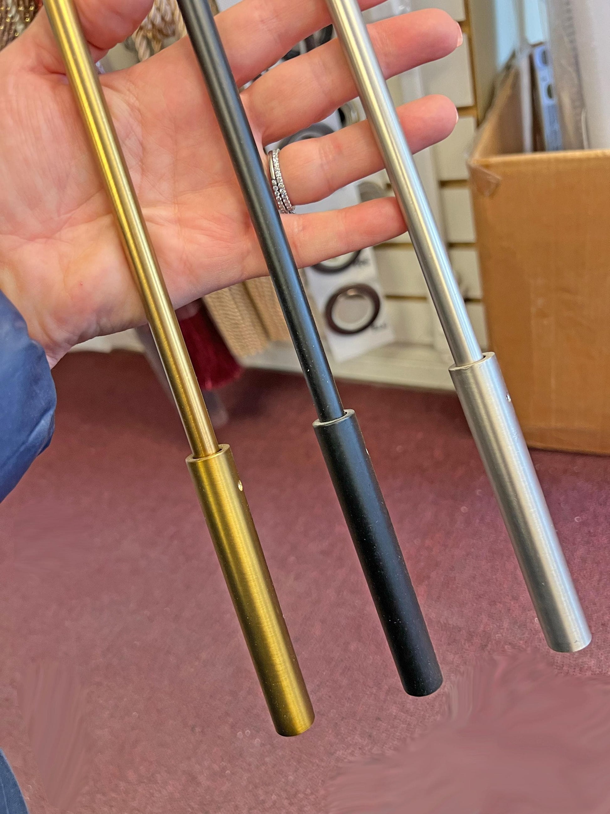 Metal baton fling wand for drapery with handle