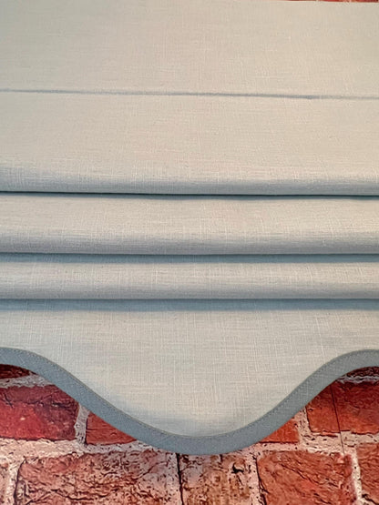 Side view of the flat Roman shade showing the chain lift mechanism