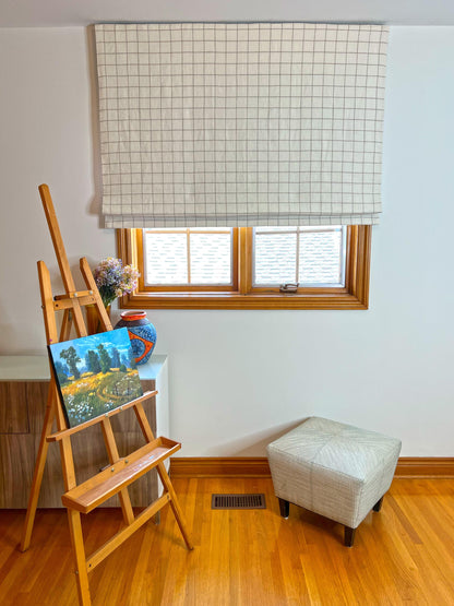 Butler natural linen roman shade in natural light