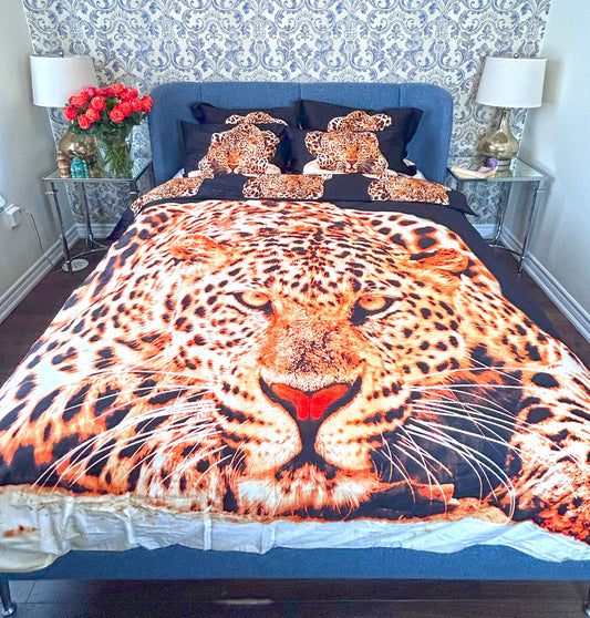 Leopard print cotton duvet cover set on a made bed, queen size