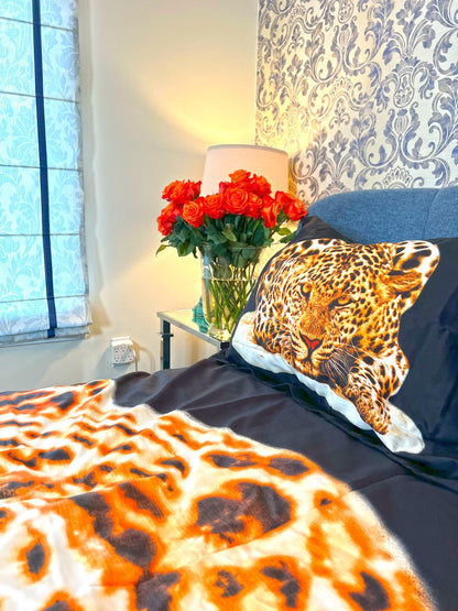 Close view of the leopard print cotton fabric and pillow shams
