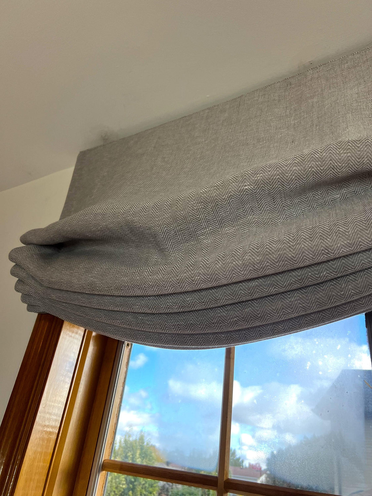 Rainfall sheer Roman shade detail, weighted bar and hem