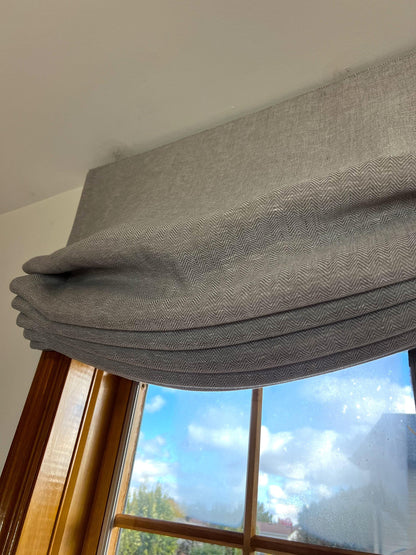 Rainfall sheer Roman shade detail, weighted bar and hem