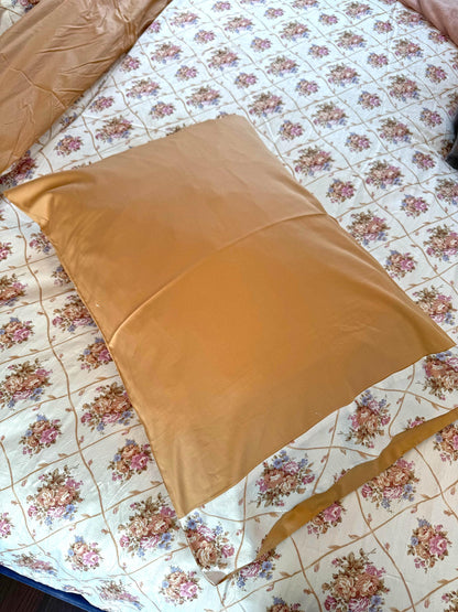 Close-up of the floral pattern on Tessa faux silk bedding