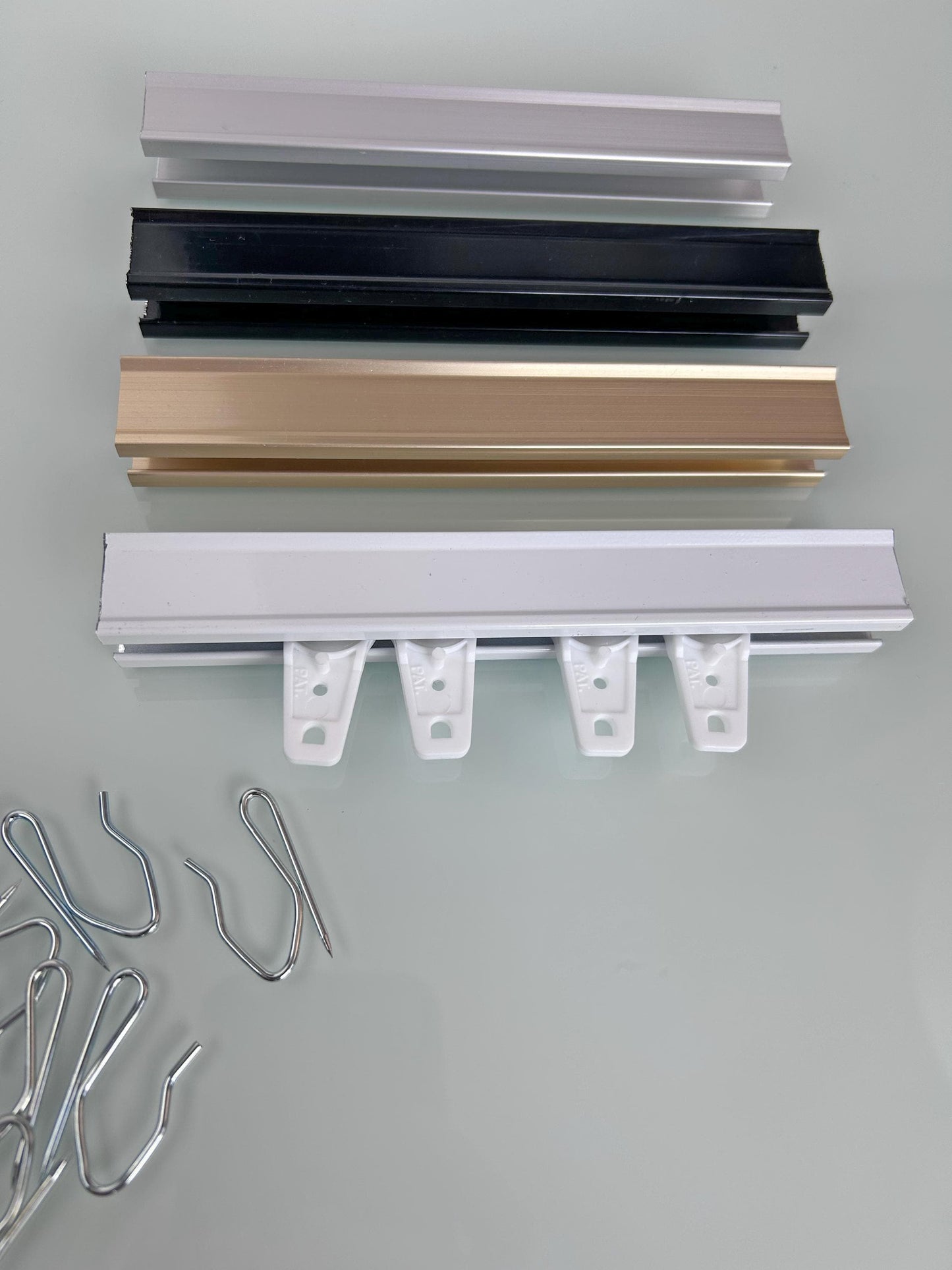 Aluminum curtain track with ball-bearing carriers smooth glide system