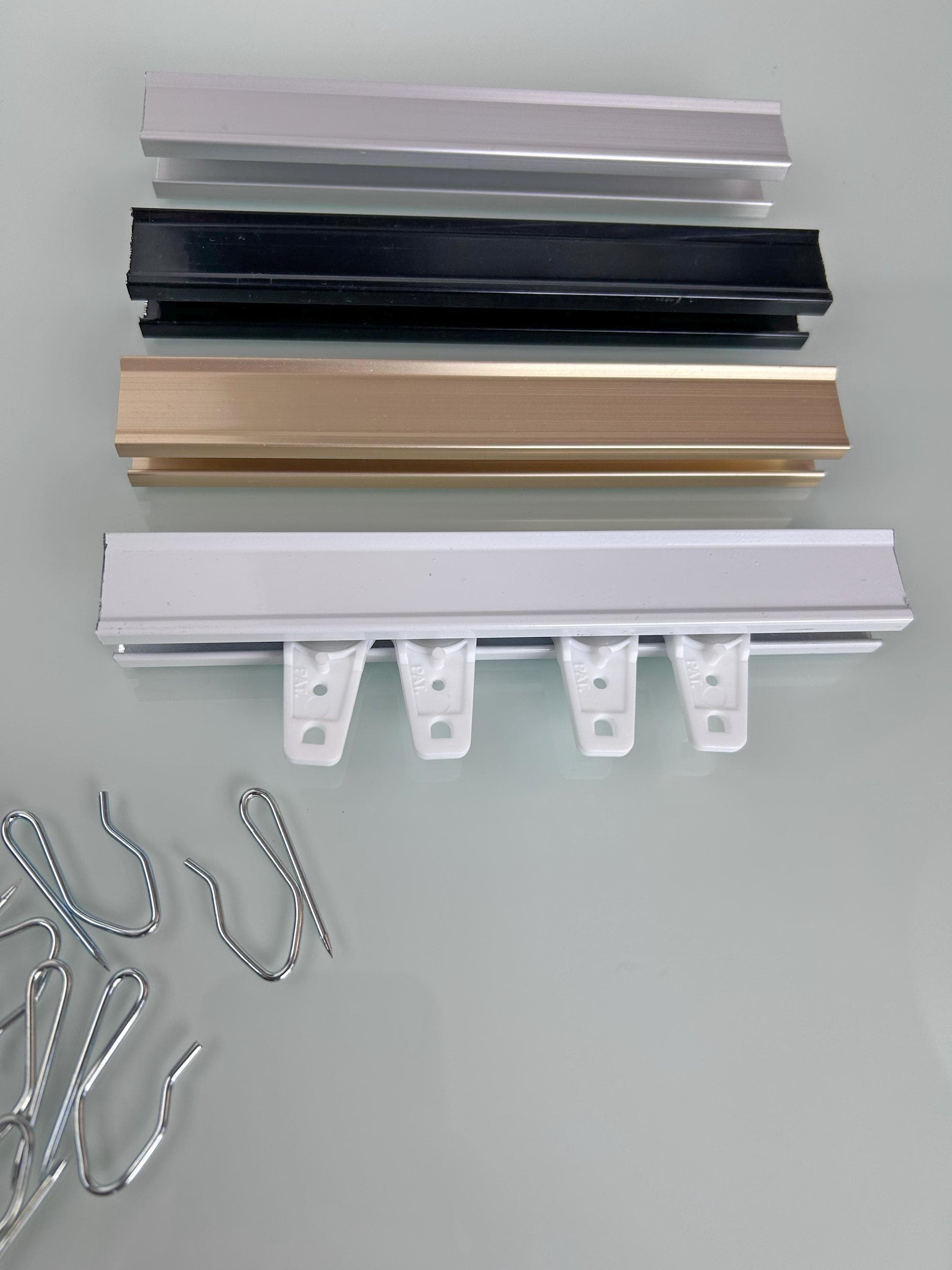 Aluminum curtain track with ball-bearing carriers smooth glide system