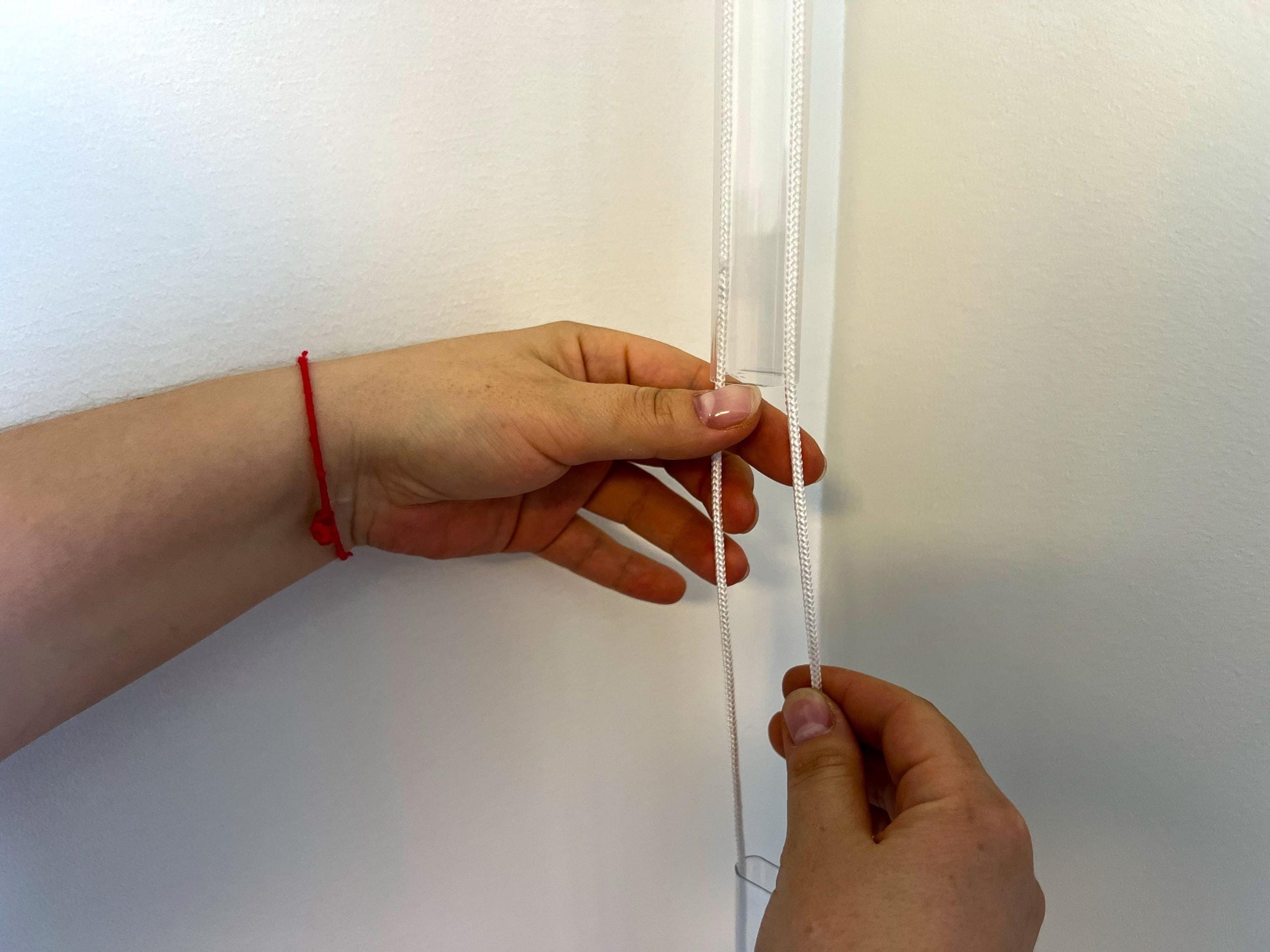 Traverse rod track with built-in nylon gliders