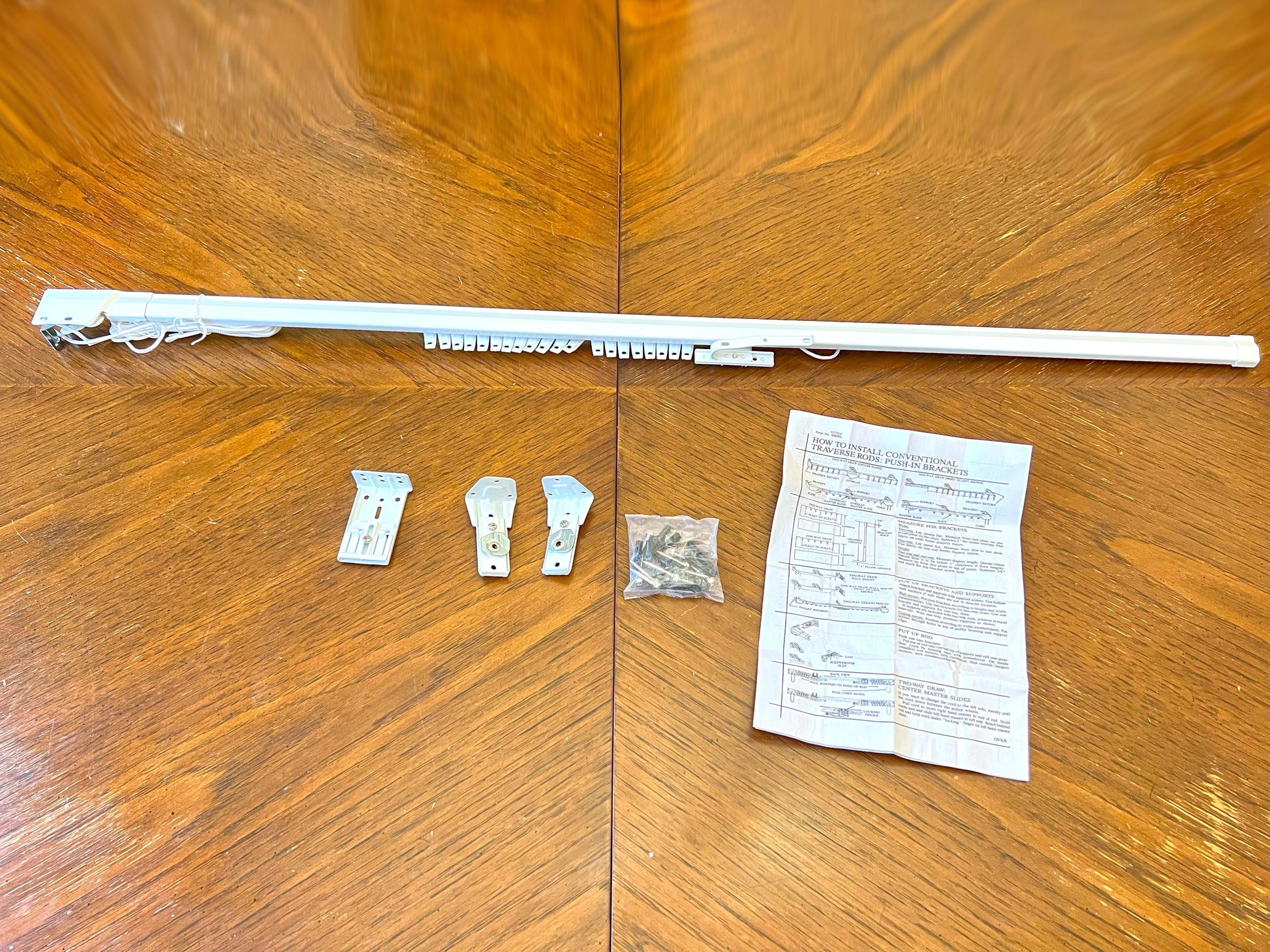 Heavy-duty white traverse rod set, one-way draw — complete kit with brackets, cord and instructions