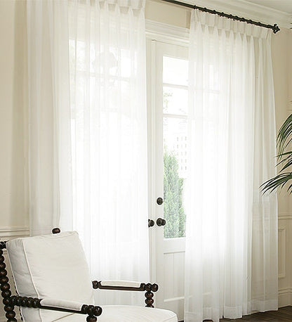 Empire voile pinch pleat sheer curtains at a French door — LOGANOVA