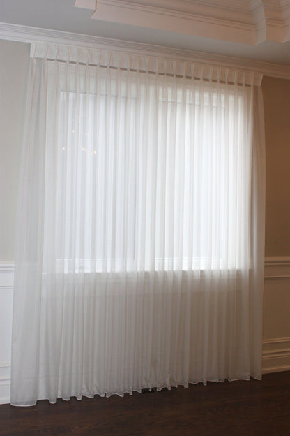 Empire voile sheer glow across a wide window — LOGANOVA