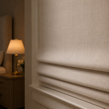 Soft relaxed folds of an Irish linen Roman shade, bedroom close-up