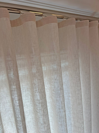 Close-up of the snap tape header on a Brent Candle ripple fold sheer, folds clipped evenly along the track
