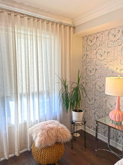Brent Candle linen-blend sheer ripple fold curtains floor to ceiling across a bedroom window, daylight filtering through