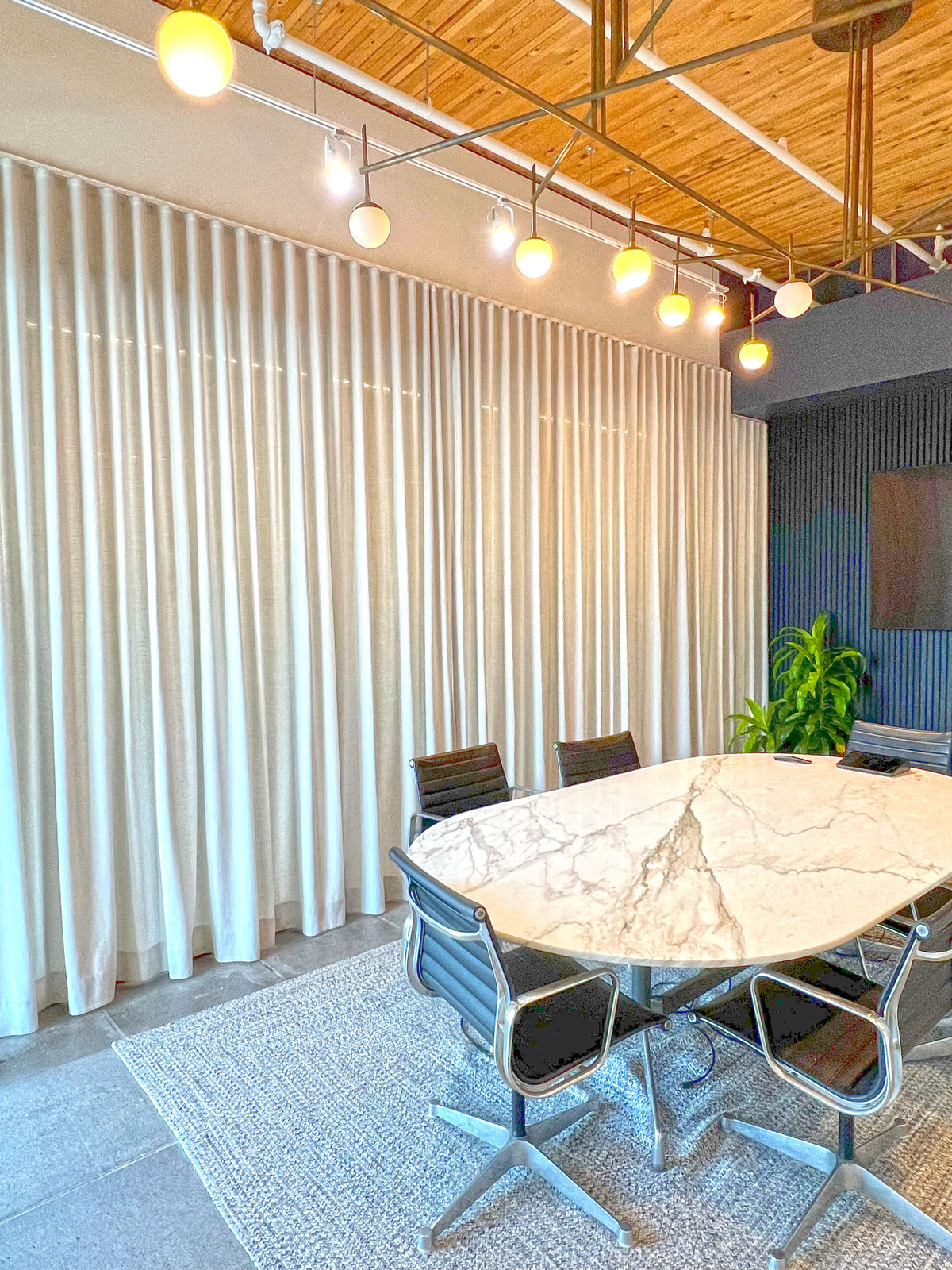 Far ripple fold drapery panel on a simple square track, custom size made-to-order window panel