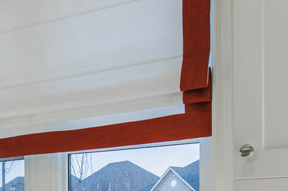 White flat Roman shade with Brick border