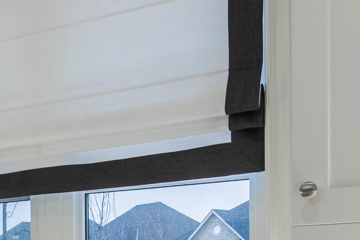 White flat Roman shade with Charcoal border