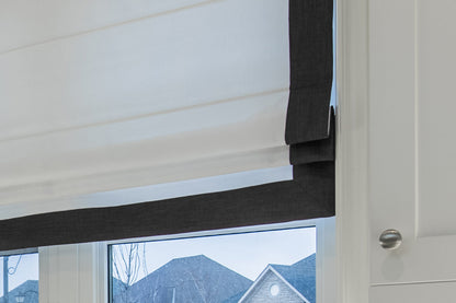 White flat Roman shade with Charcoal border