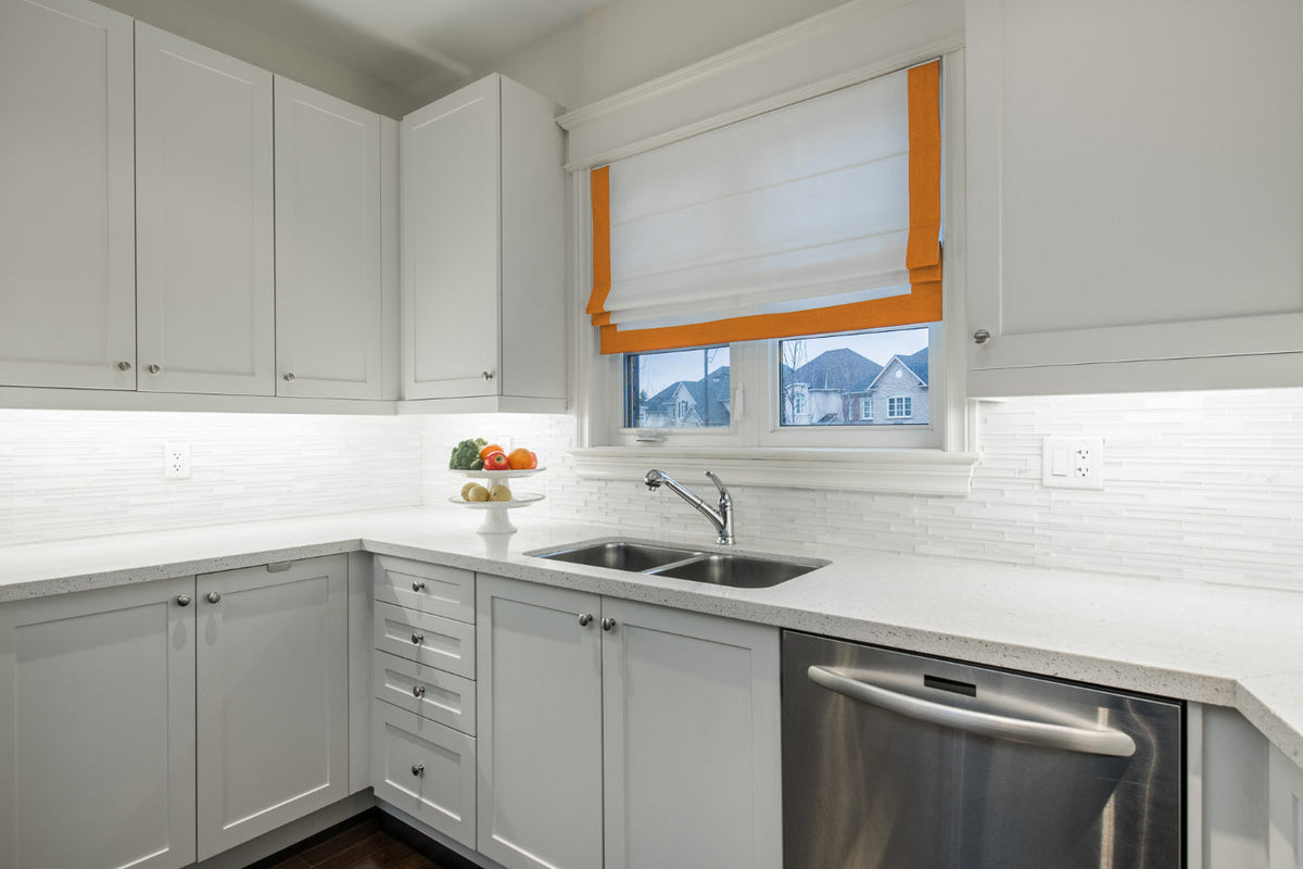 White flat Roman shade with Mango border