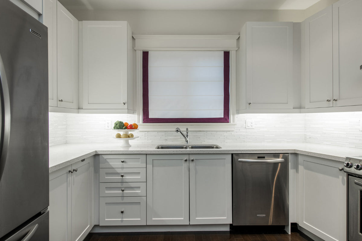 White flat Roman shade with Plum border