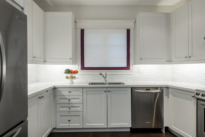 White flat Roman shade with Plum border