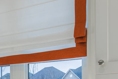 White flat Roman shade with Tangerine border