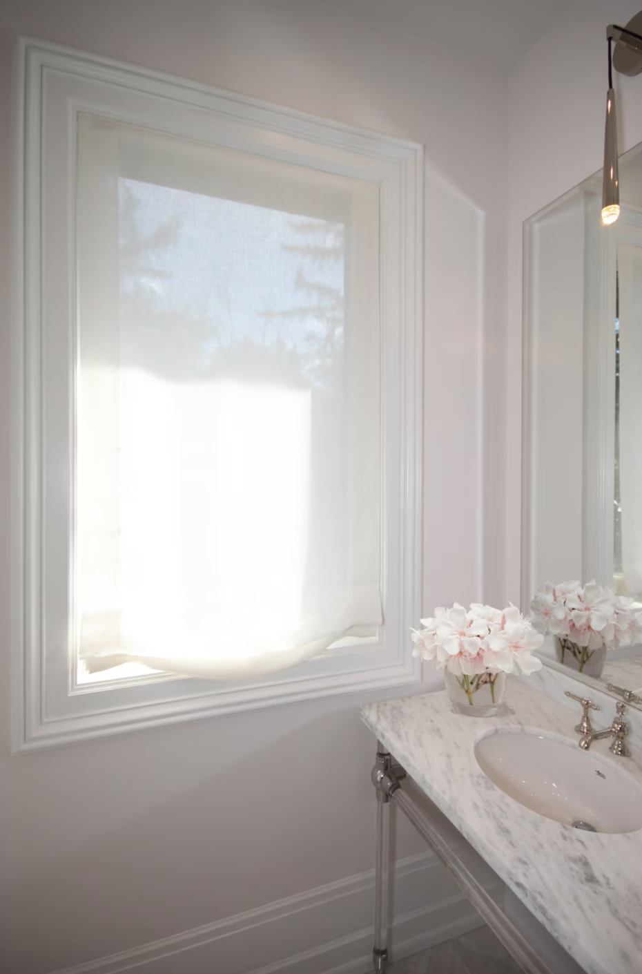 Sheer linen Roman shade — relaxed fold detail